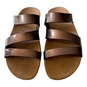 FIT FLOP | Superjelly Twist Slide Sandals in Bronze